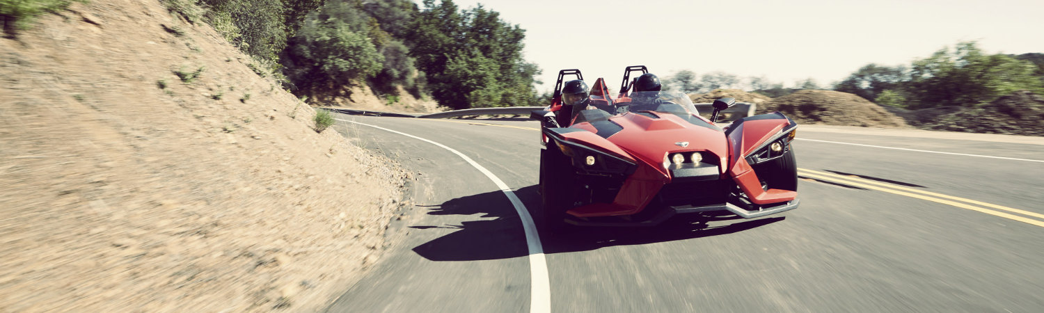 Polaris Slingshot 3 Wheeler driving on the road